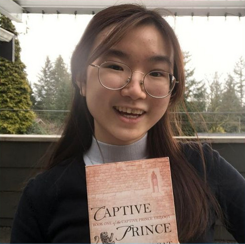 Sabrina holding her favourite book